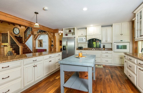Rutherfordton Cabin | Riverside opulence with game room, private heated pool, hot tub & firepit