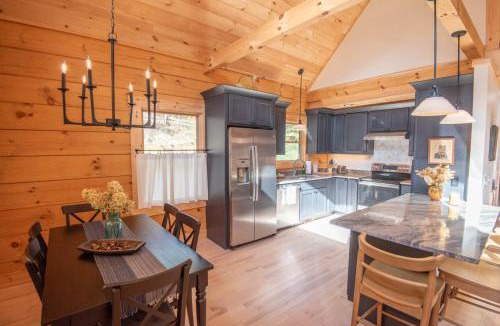 Warrensville House | Riverstead Cabin- Riverfront, Wrap Around Porch, Hot Tub & More