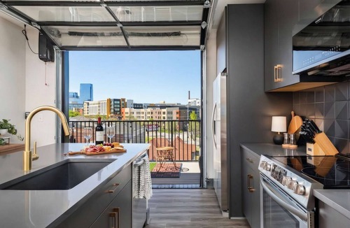 Rolling Mill Hill Apartment | Rooftop Deck Skyline Views Downtown Penthouse