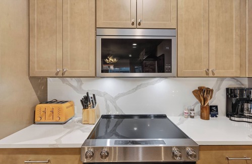 Katie Hill Neighborhood House | Rooftop Lounge + Hot Tub + Karaoke + Firepit | Katie Hill Collection