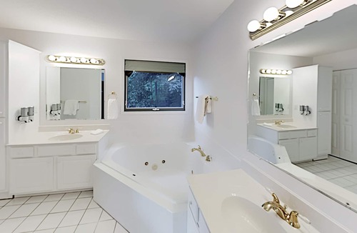 Stonecrest House | Rumbling Bald Resort getaway with 2 living areas, foosball & golf course views