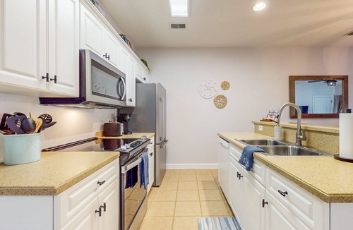 Sea Trail House | SB72A: Coastal Villa with golf course view and shared pool access