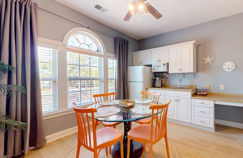 Sea Trail Apartment | SB72B: Coastal Suite with golf course view and shared pool access