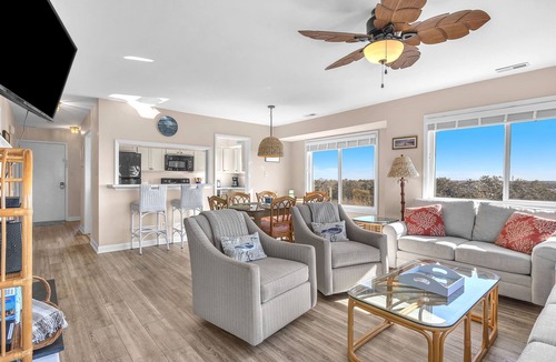 Caswell Beach Condo | Sea-Nic View: Beachwalk condo in Caswell Beach with a community seasonal pool an