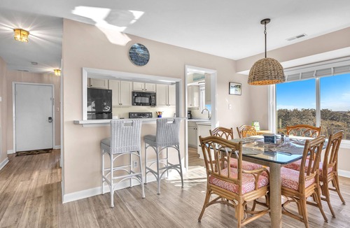 Caswell Beach Condo | Sea-Nic View: Beachwalk condo in Caswell Beach with a community seasonal pool an