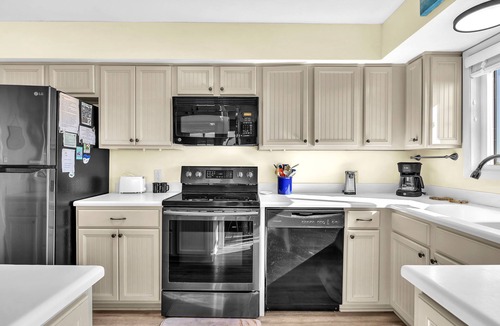 Caswell Beach Condo | Sea-Nic View: Beachwalk condo in Caswell Beach with a community seasonal pool an