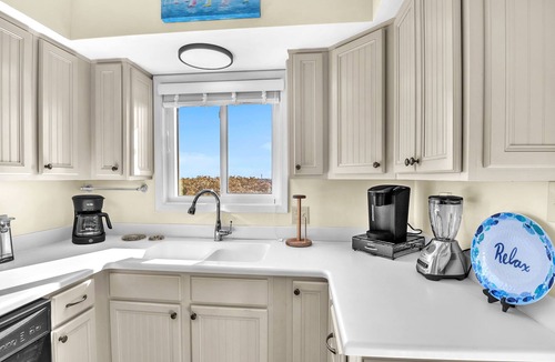 Caswell Beach Condo | Sea-Nic View: Beachwalk condo in Caswell Beach with a community seasonal pool an