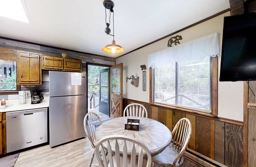 Murphy House | Secluded home with deck, firepit, sunroom, gas fireplace, & W/D