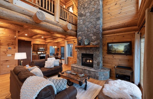 Almond Cabin | Secluded log cabin with fireplace and hot tub on deck.