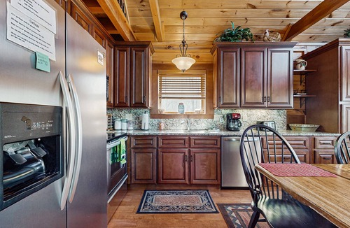 Whittier Cabin | Secluded mountain view log cabin with WiFi, fireplace, & wrap-around porch