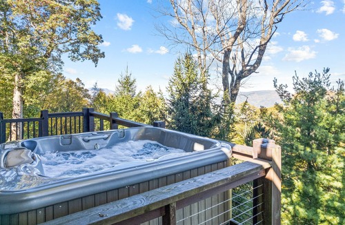 Clyde House | Secluded Smoky Mountain home with panoramic views, wood stove, & hot tub