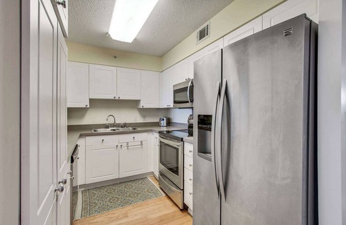 Folly Beach House | Second-floor condo with river views and access to a community pool