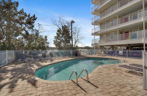 Folly Beach House | Second-floor condo with river views and access to a community pool