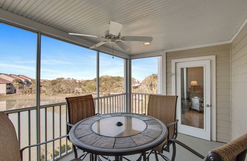 Folly Beach House | Second-floor condo with river views and access to a community pool