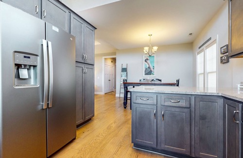 Caswell Beach House | Slowin' Dune | Lavish Island Getaway with Golf Cart Near Beach, Golf, & Dining