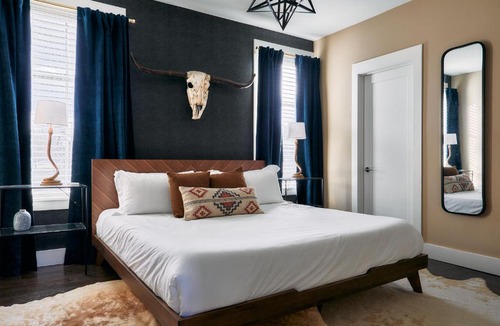 Nashville Apartment | Soaring Ceilings & King Beds Overlooking Courtyard, 1 of 7 Themed Lofts at Cowrite, Find Coffee and Tacos Downstairs, Complimentary Spin Class, Walk to Shopping in 12 South, 10 Minutes to Broadway, Parking, 24 Hr Hospitality