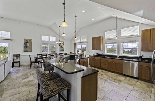 Wind Over Waves House | Soundside Dog Friendly w/Pool, Elevator, Hot Tub, Game and Theater Rooms