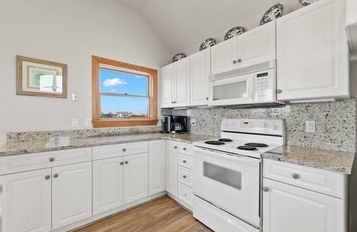 Kinnakeet Shores House | Soundside Dog Friendly w/Pool, Hot Tub, Community Pool and Tennis/Pickleball