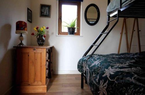 Gooseham House | Spacious cabin on isolated farm with sea view
