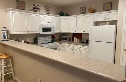 Long Beach Condo | Spacious clean condo, large pool, plus many extras. Perfect for families.