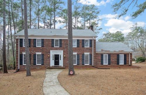 Terry Sanford House | Spacious Family Oasis with Hot Tub & Game Tables