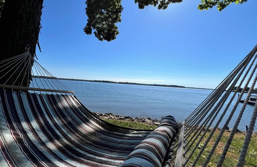 Lake Norman of Catawba Cottage | Spring on Lake Norman: Stunning sunrises, firepit nights, kayaks, fishing