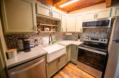 Cherokee Cabin | Stay in the Treehouse Lodge! Hot tub, game room, fire place, wrap around porch!