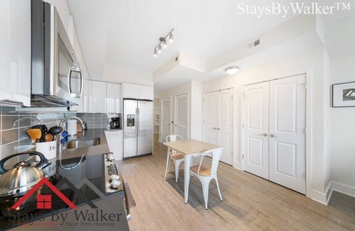 Charlotte Center City Condo | StaysByWalker Studio-King Bed! Roof Top Pool! Gym!