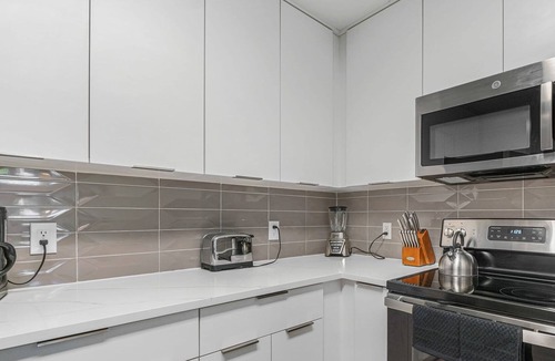 Charlotte Center City Condo | StaysByWalker Uptown 6BR w/King Beds! Gym/Parking