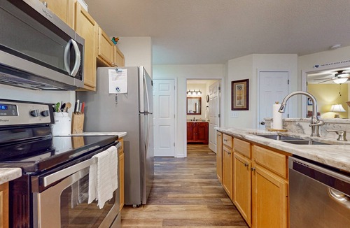 St. James Condo | STJ22 A&B: Coastal Condo with golf course view and shared pool access