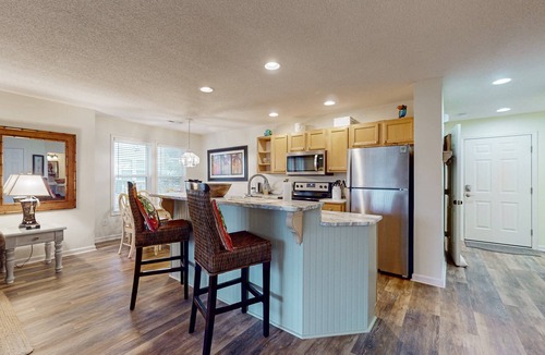 St. James Condo | STJ22 A&B: Coastal Condo with golf course view and shared pool access