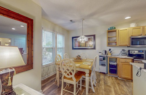 St. James Condo | STJ22A: Coastal Condo with golf course view and shared pool access