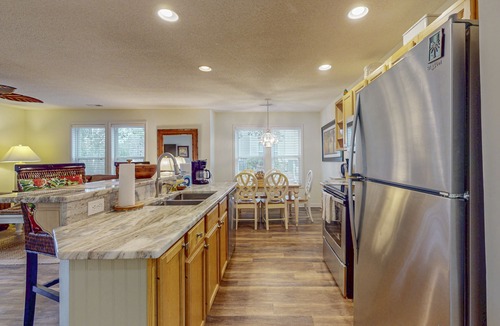 St. James Condo | STJ22A: Coastal Condo with golf course view and shared pool access