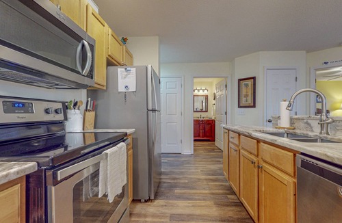 St. James Condo | STJ22A: Coastal Condo with golf course view and shared pool access