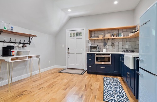 Matthews House | Studio above a detached garage away from main house on a private lot.