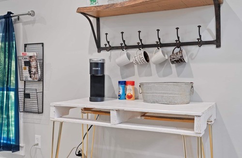 Matthews House | Studio above a detached garage away from main house on a private lot.