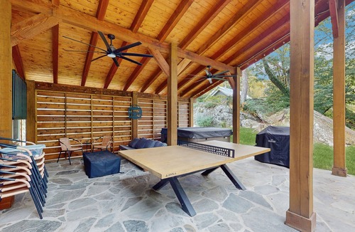 Foscoe Cottage | Stunning dog-friendly cottage with riverfront patio, hot tub, fire pit, & views