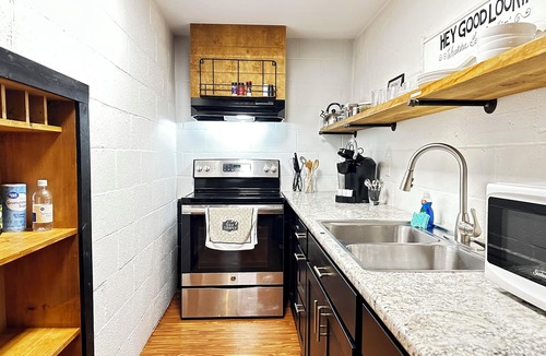Madison Apartment | "SUITE LINDA" walk-out suite in a park setting