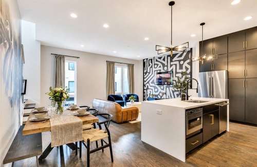 Katie Hill Neighborhood House | Summer rooftop hot tub, game room, skyline views near Broadway