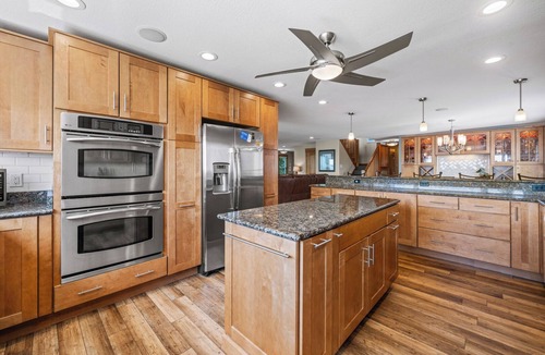 Colington House | Sunset Bay 5 Bedroom Home with a Jacuzzi Tub, Work-Out Room and Bayside Access!