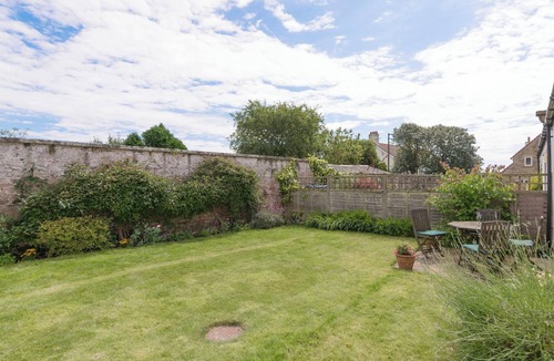 Beadnell Cottage | Superb cottage situated on a quiet road with a walled garden to the rear.