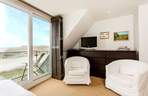 Lusty Glaze Cottage | Surfside, a spacious and beautifully presented beachfront home