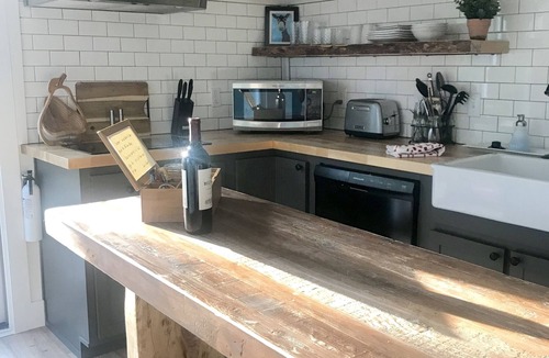 Woodfin Cottage | Sweet & cozy cottage with a mix of modern & vintage style awaits you!