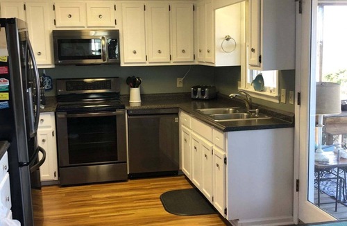 Holden Beach House | Tailslide Inn: Spacious 4-bedroom at Holden Beach, perfect for family getaways!