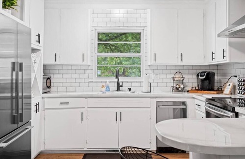 Greensboro House | The Boro Bungalow. A Mid-modern home. King beds.