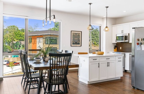 Historic Montford Condo | The Kingfisher - Fantastic 2-bedroom condo with mural, elevator, and WFH setup