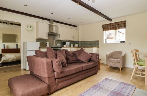 Storwood Cottage | THE PADDOCK, with open fire in York