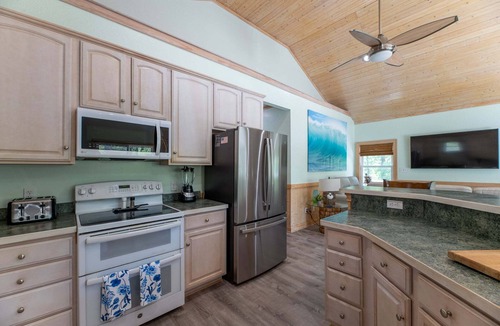 Carova Beach House | The Shore Bird - 4x4 Beach, Pool Table, Ping Pong, Pets OK, YR Flex Stays