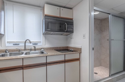 Airlie Condo | The Waterway 227: King + FSS Studio with complex pool