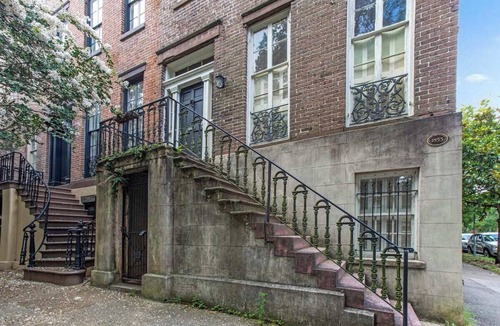 Old West Broad Neighborhood Apartment | This Classical Parlor is located on Chatham Square. It offers a quiet retreat with natural light, floor-to-ceiling windows, and views of the Square.